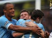 九游APP-街道与绿茵的交响，当F1引擎轰鸣遇见苏格兰风笛凯旋